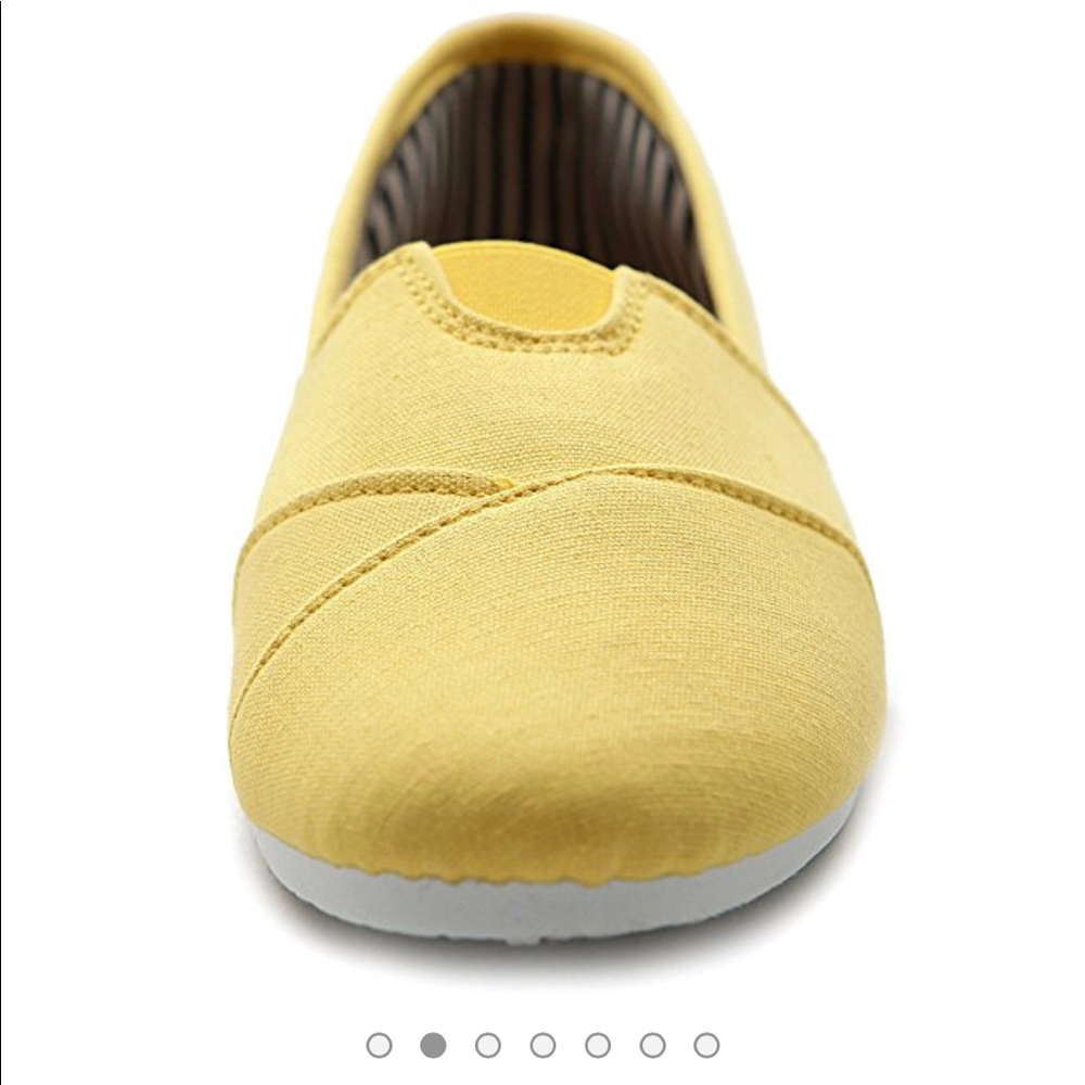 Yellow canvas slip-ons